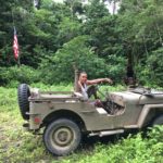 Local Munda man Alfie Rex Lai poses with his fully restored WWII jeep, a labor of love that took him almost 10 years. (Photo credit: Rebecca Strauss)