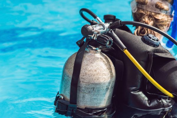 Scuba diving photo: bcd tank poolside