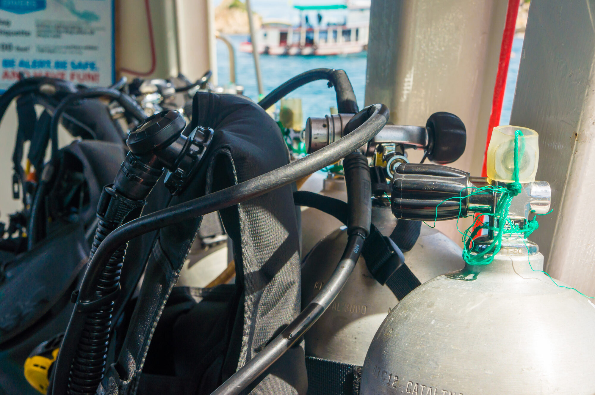 Scuba diving photo: regulator hoses bcd tanks